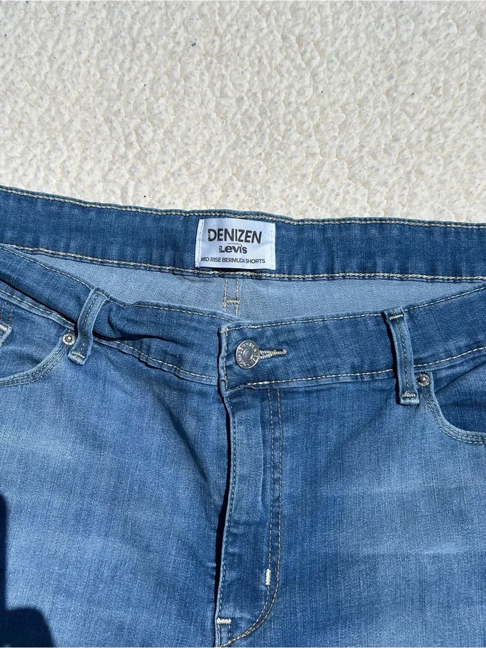 Levi’s Denizen Women’s Mid Rise Bermuda Denim Shorts.